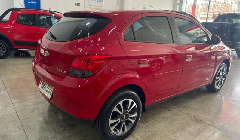 
								Chevrolet Onix  1.4 full									